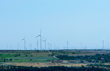 Fototapeta na wymiar Clean energy. Wind energy. Field with many wind turbines. Alternative energy