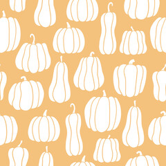 Pumpkin seamless pattern. White pumpkins of different shapes. Hand drawn vector illustration on orange background