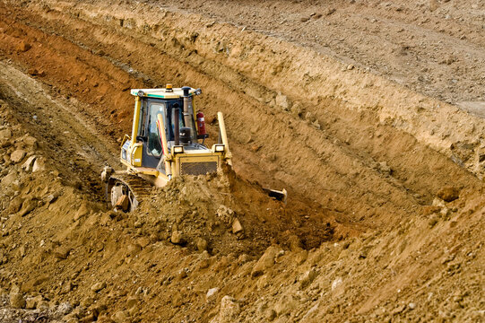 A tlb bulldozer on a construction site