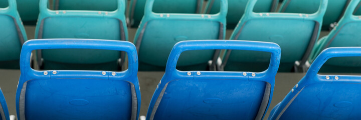 Panoramic image. Empty seats at the stadium without the spectators due to the Corona Virus Covid-19