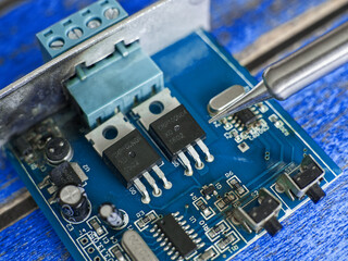 Damaged electronic board during repair with a soldering iron
