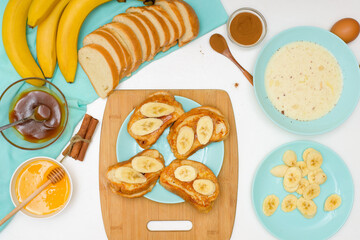 step by step recipe portioned French toast with banana and caramel homemade with cinnamon, dessert on a blue plate on a light background. ingredients for making homemade toast