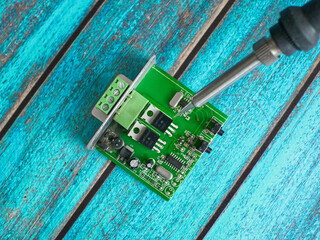 Damaged electronic board during repair with a soldering iron