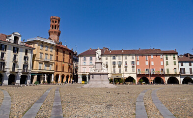 Fototapeta na wymiar Piazza Cavour, the central square of the town, dominated by the Torre dell'Angelo (Angel's Tower)