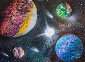 Spray painting galaxy on paper
