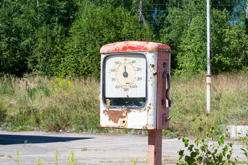 An old automobile petrol station in the countryside.