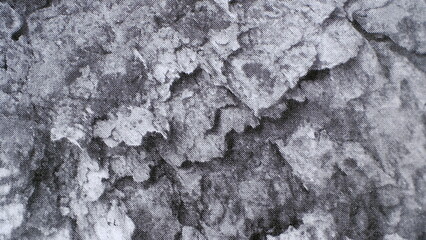 Obraz premium Black and white spots of paint on a sheet of paper