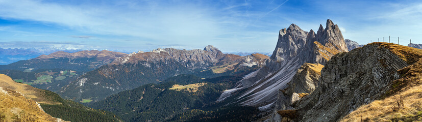 Picturesque autumn Alps mountain scene, famous italian Dolomites Seceda majestic rock, Sass Rigais, Sudtirol, Italy. Beautiful traveling concept high resolution ultra wide panoramic scene.