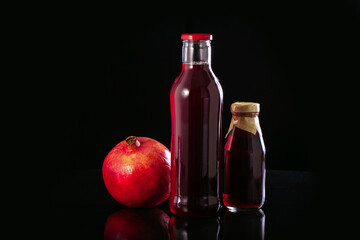 Fresh pomegranate juice in a bottles.