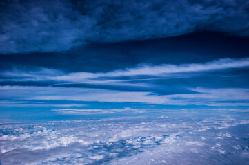 Aerial view of the fantastic and curious clouds, View on an airplane,
