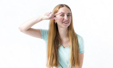 Fototapeta premium Portrait of a smiling girl. Girl on white background