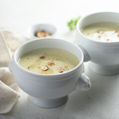 Homemade white asparagus soup with hazelnut