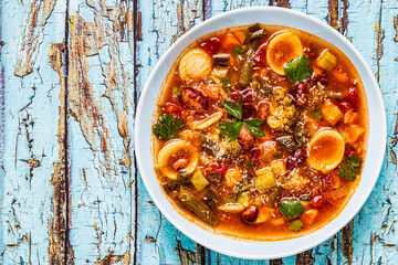 Minestrone, italian vegetable soup with pasta and beans.