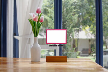 white laptop with flowers