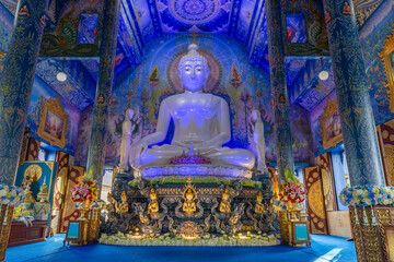 Fototapeta na wymiar Wat Rong Suea Ten or the Blue Temple is above all its magnificent blue interior at Chiang Rai, Thailand 
