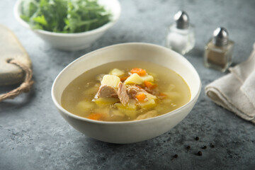 Homemade fish soup with vegetables