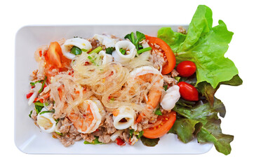 Spicy  glass noodle salad with shrimp dish on cloth floor