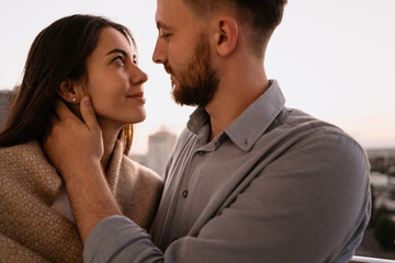 Portrait lovely couple hugging each other, smiling, enjoying time together. Emotional moments