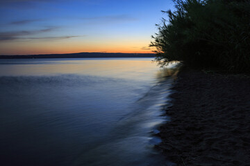 Lake Bolsena at sunset. colors, nature and a spectacular landscape