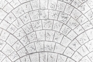 Vintage white cobblestone pavement pattern and background