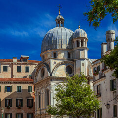 Fototapeta na wymiar View of the famous St Mary of the Miracles or 'Marble Church' dome, a renaissance architectural jewel in the historic center of Venice