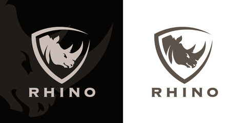 Concept Rhino head and shield company logo icon. Premium Rhinoceros brand identity emblem. African animal business sign. Vector illustration.