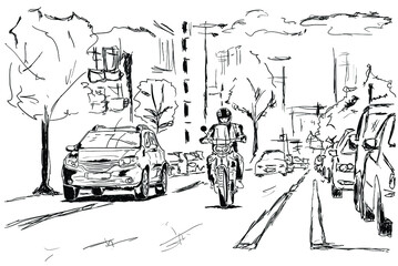 A motorcyclist rides the streets of a big city