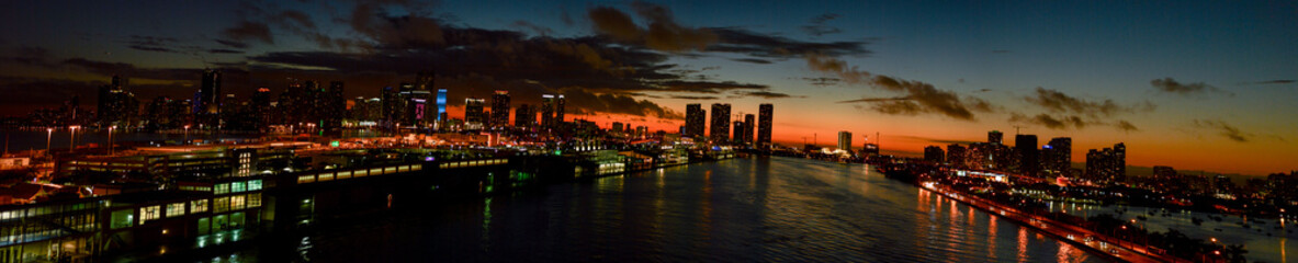 Port of Miami sunset city skyline view from cruise ship leaving the port