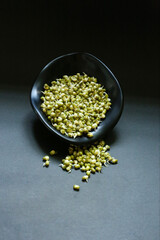 Mung bean in a bowl with a dark background, Cooking concept