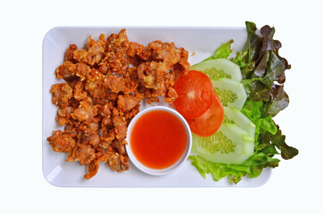 Crispy fried chicken tendon with chili sauce and vegetable dish