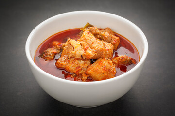 Moo Chamuang, Thai food, sweet, sour and spicy curry pork with Cowa leaves (Garcinia cowa Roxb. ex Choisy), famous local food of  Rayong, Chanthaburi and Trat provice