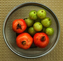 Pomegranate and Gooseberries on Plate