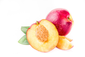 Fototapeta na wymiar Raw peaches isolated on white