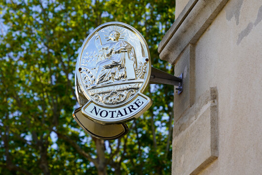 notary sign and text golden logo in building office for french Notaire