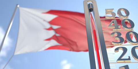 Thermometer shows high air temperature against blurred flag of Bahrain. Hot weather forecast related 3D rendering