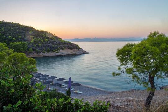 Amazing beach at blue hour (sunset  time)  on awe greel islands (Spetses island)