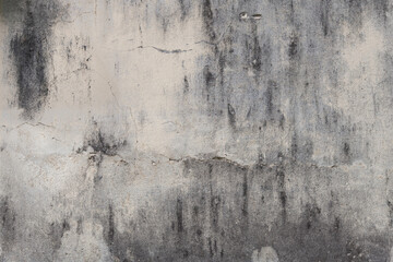 Grey and white concrete wall texture with cracks and scratches. Fragment of old wall, for background or texture.