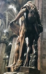 statue with no skin in italy - flayed man of milan duomo