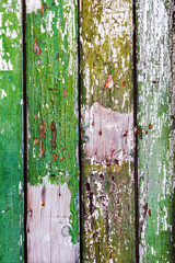Background gloomy charred wooden fence in dark colors