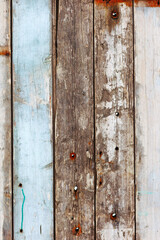 Background gloomy charred wooden fence in dark colors