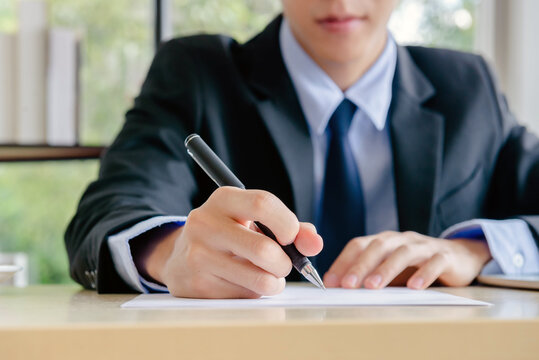 business man sign document