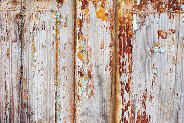 Background gloomy charred wooden fence in dark colors