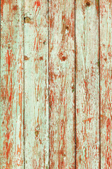 Background gloomy charred wooden fence in dark colors