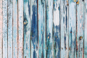 Fototapeta na wymiar Background gloomy charred wooden fence in dark colors