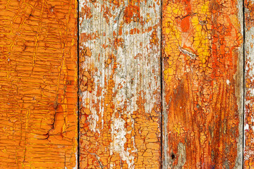 Background gloomy charred wooden fence in dark colors