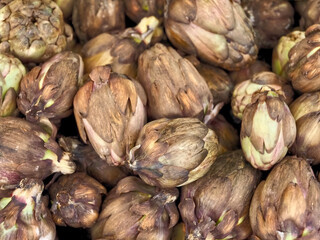 Pile of Delicious artichokes at a food market