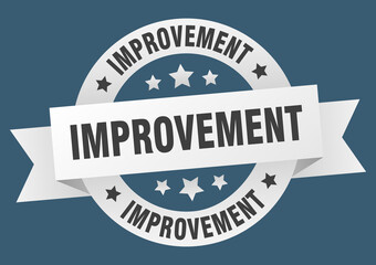 improvement round ribbon isolated label. improvement sign