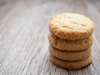 Stacked biscuit sweet cookie on rustic wooden table