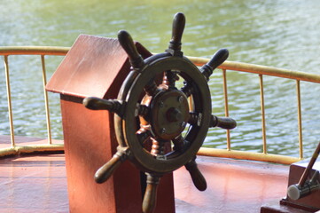 steering wheel of boat © Sansitha