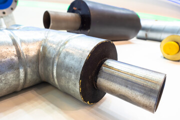 Metal pipe with insulation. Thermal insulation of pipes. Pipes for heating and water supply...